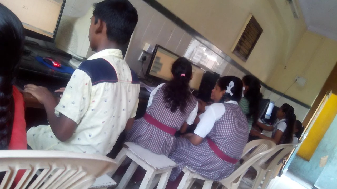 Students learning computer skills
